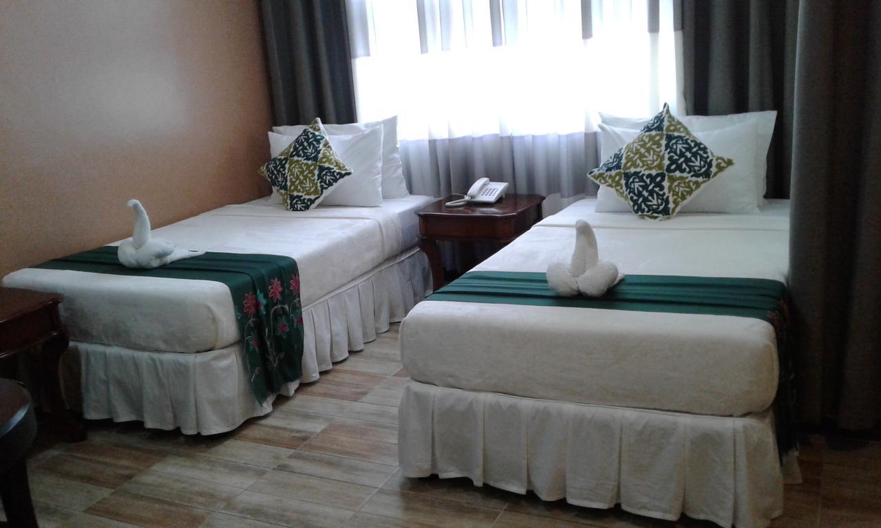 Charos Dormitel Hotel Dumaguete City Eksteriør billede