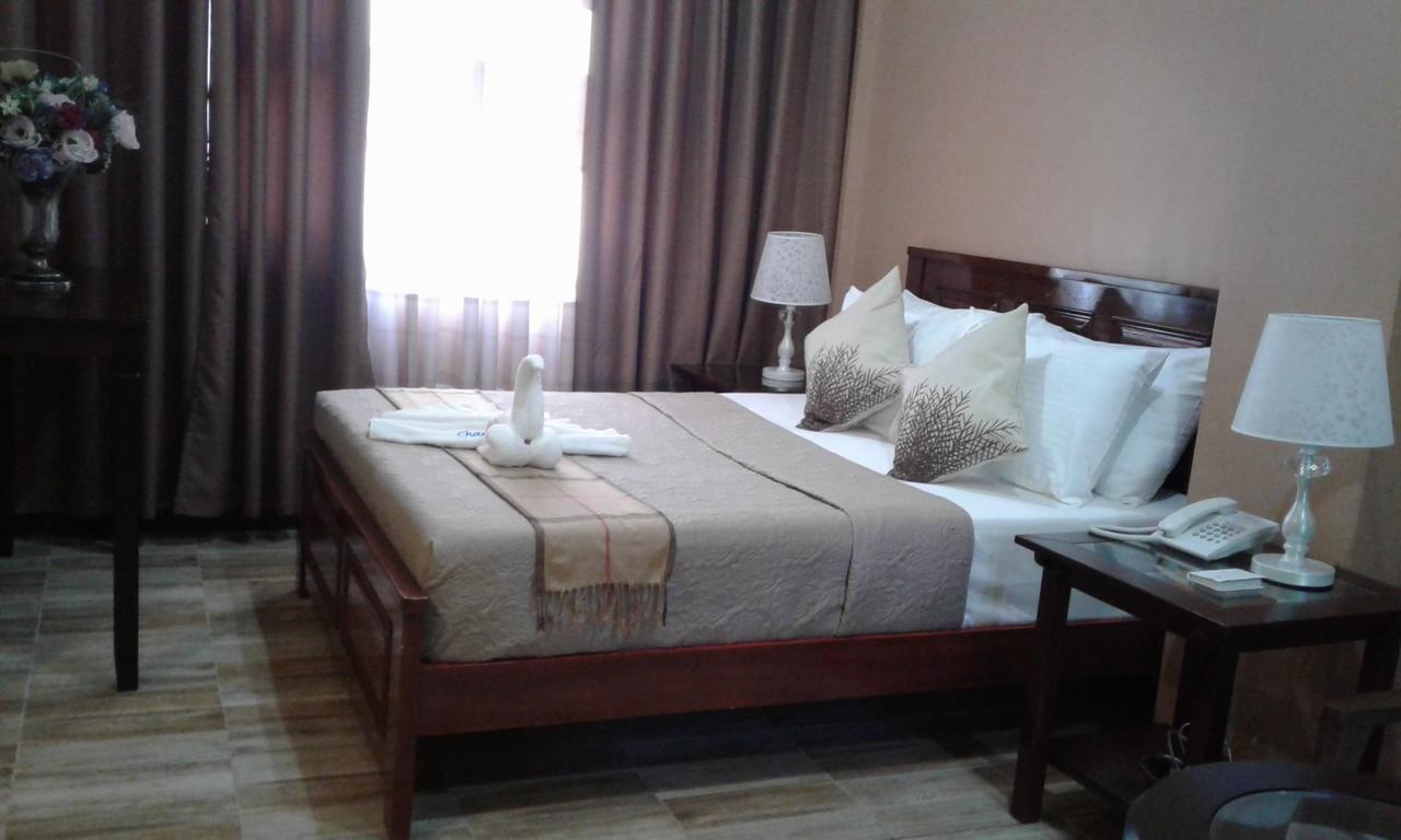 Charos Dormitel Hotel Dumaguete City Eksteriør billede