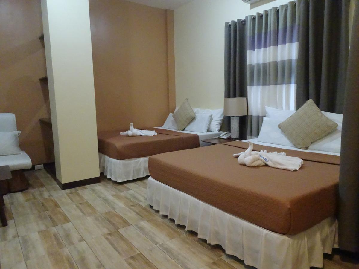 Charos Dormitel Hotel Dumaguete City Eksteriør billede