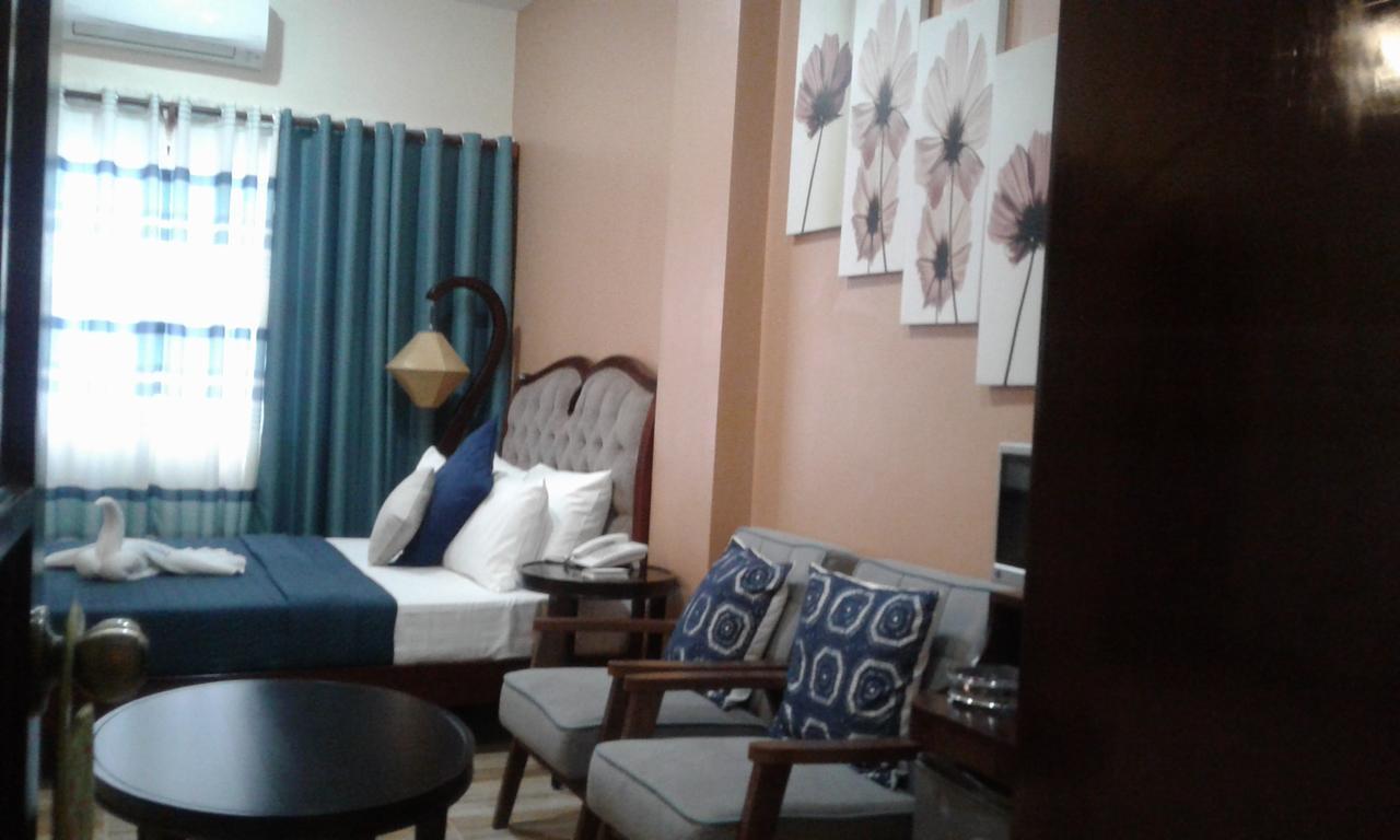 Charos Dormitel Hotel Dumaguete City Eksteriør billede